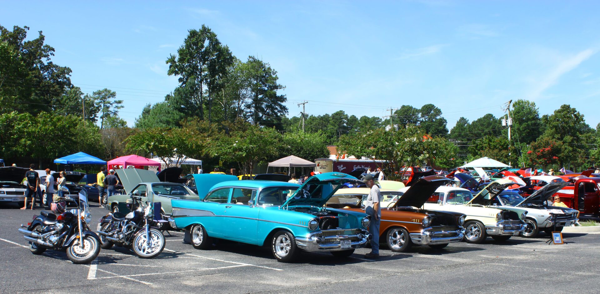 A group of cars parked in the parking lot.