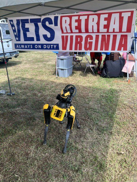 Yellow robot dog at vets retreat